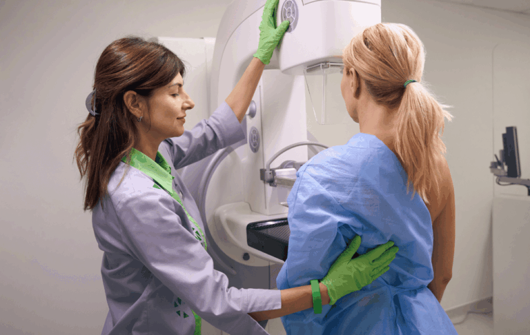 Woman about to do a mammogram